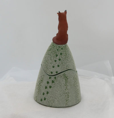Ceramic trinket holder with a fox on top.