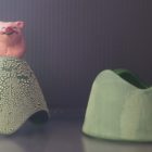 Ceramic trinket holder with a pig on top.