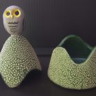 Ceramic trinket holder with a owl on top.