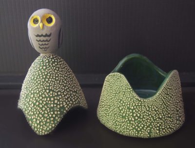 Ceramic trinket holder with a owl on top.