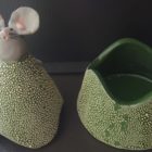 Ceramic trinket holder with a mouse on top.