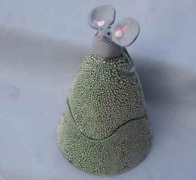 Ceramic trinket holder with a mouse on top.