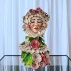 Handmade Victorian woman ceramic sculpture with lace hat and roses.