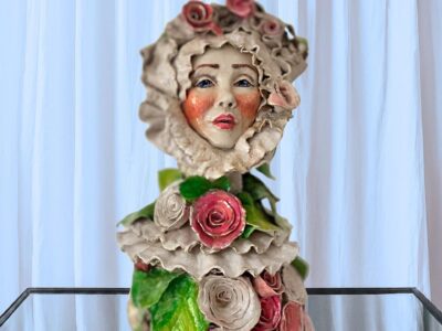 Handmade Victorian woman ceramic sculpture with lace hat and roses.